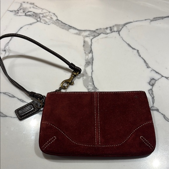 Coach Burgundy Suede Wristlet in good condition. - Picture 1 of 3